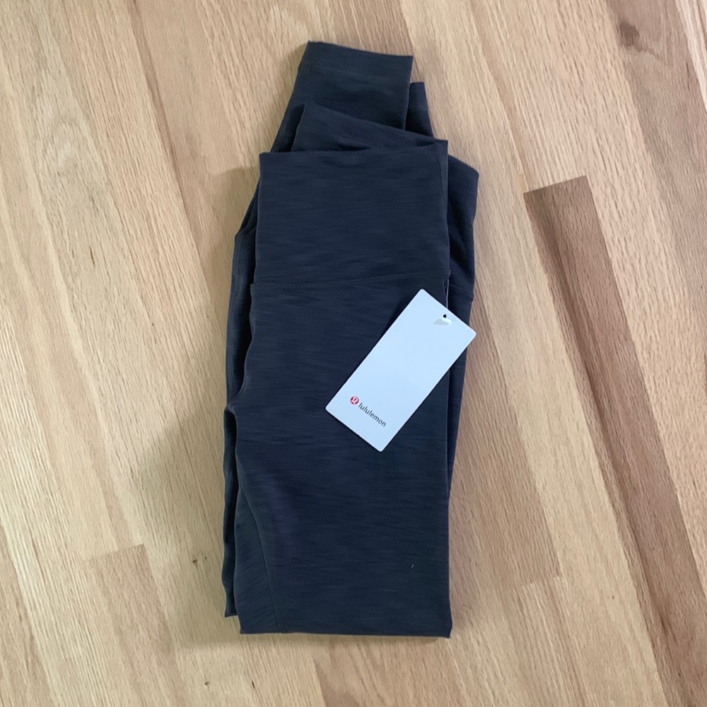 NEVER WORN** new lululemon wunder train leggings in heather gray.